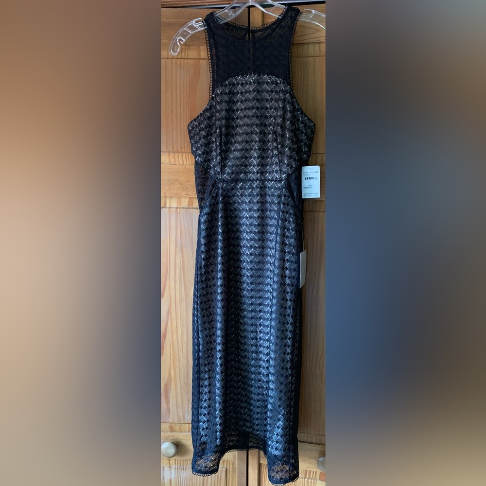 Women’s  black lace styled lined dress.